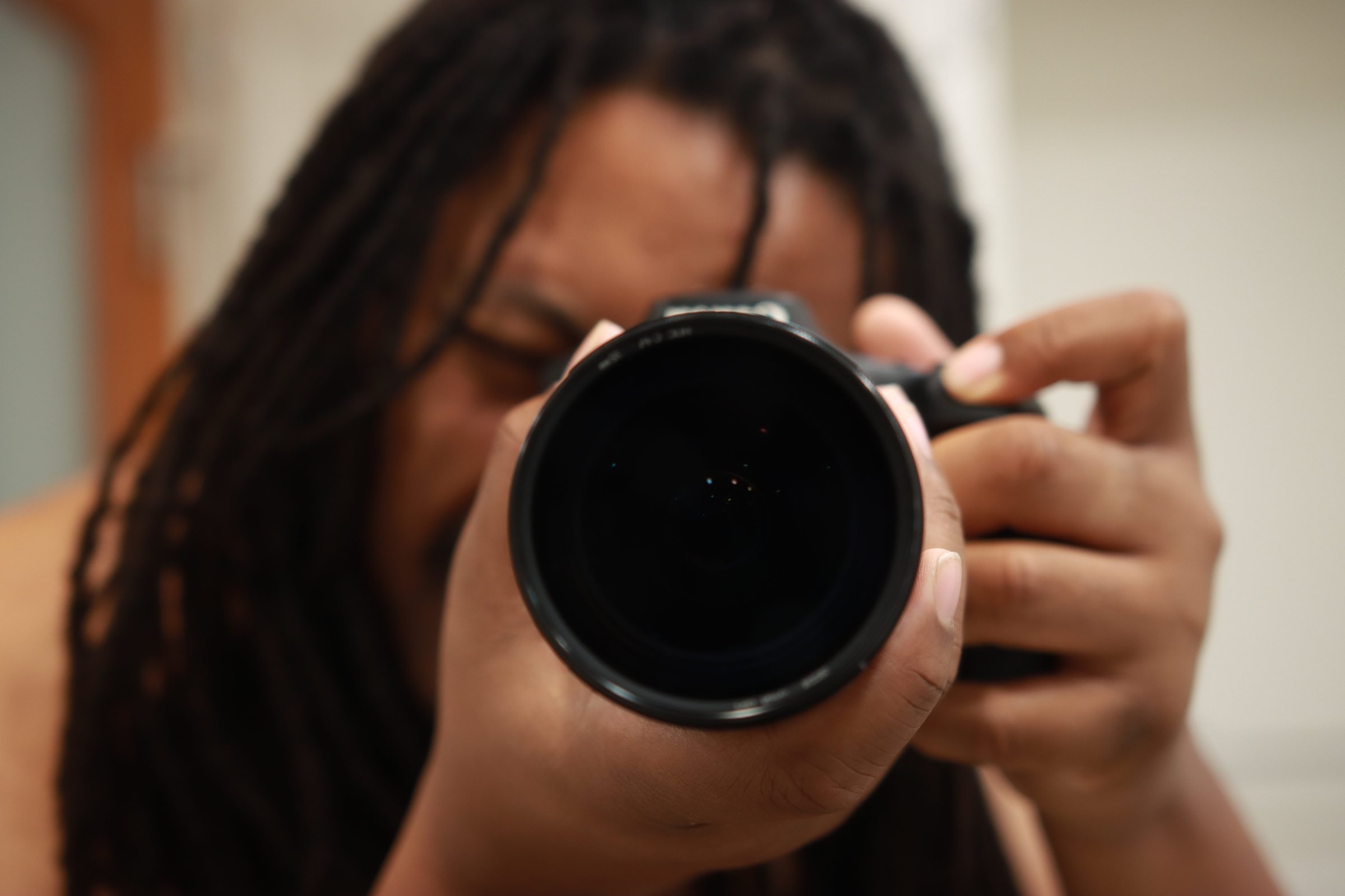 Self portrait: the photographer behind a Canon lens